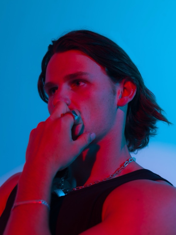 Audent close up portrait in red and blue light, press photo